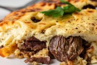 Albanian Tavë Kosi: A Savory Lamb and Rice Bake
