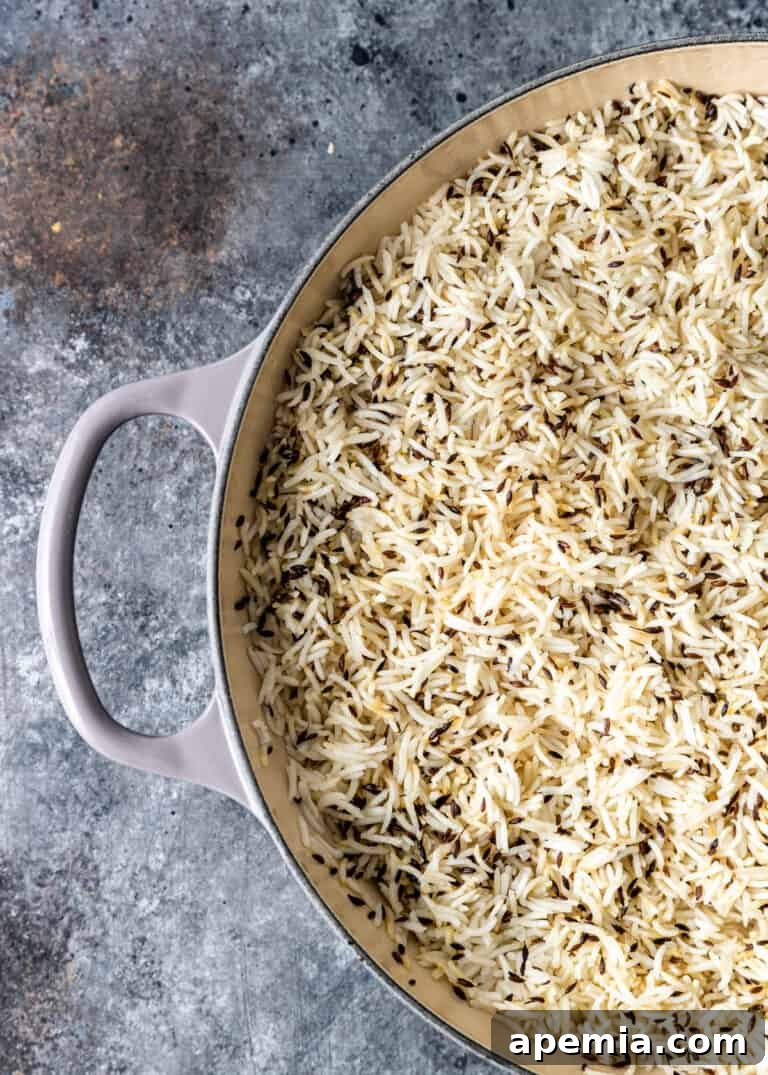 Aromatic Jeera Rice 7 overhead: large pot of fluffy indian cumin rice