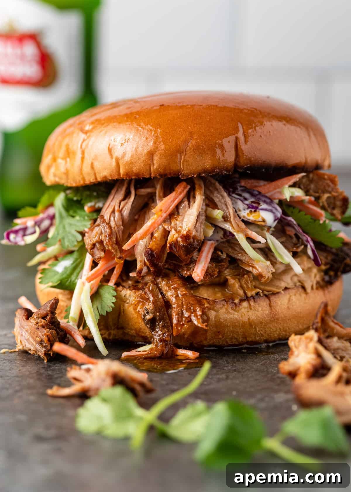 pork slider with sauce and coleslaw
