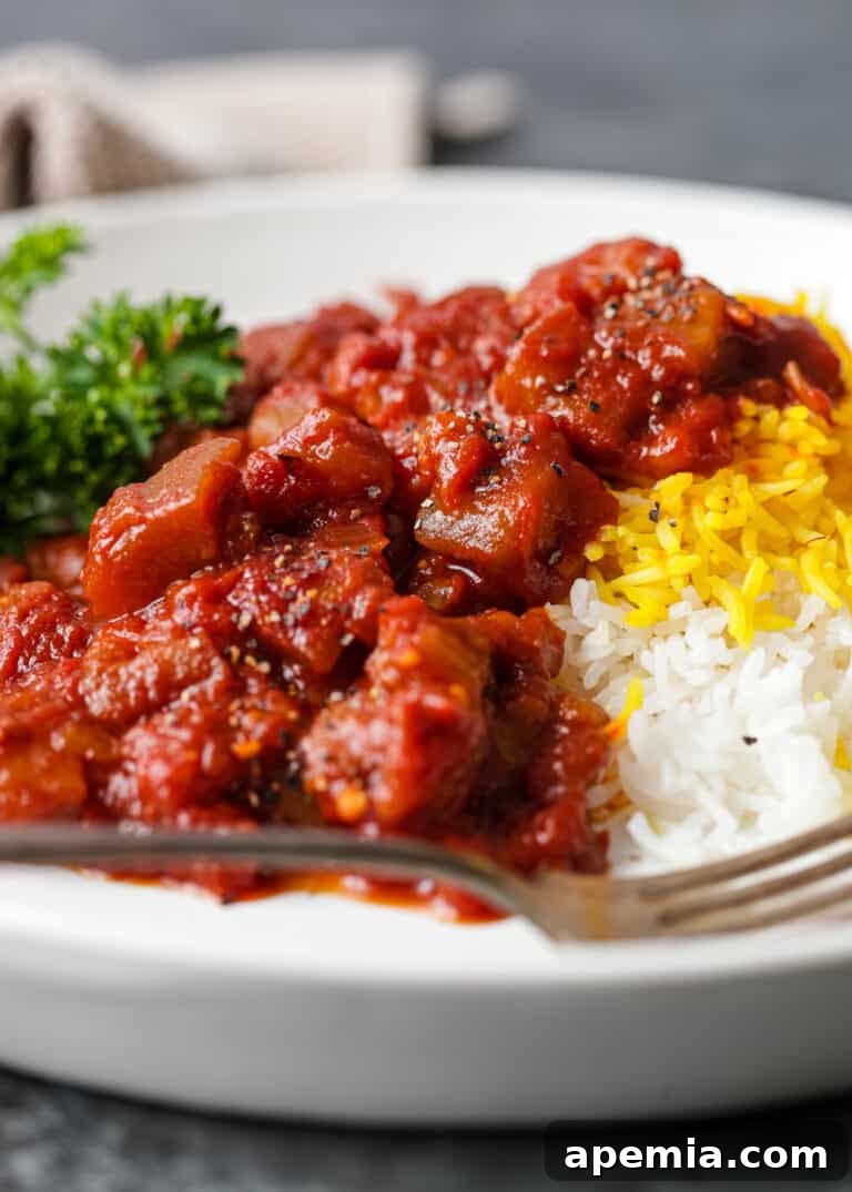 side view: plated serving of Persian eggplant stew