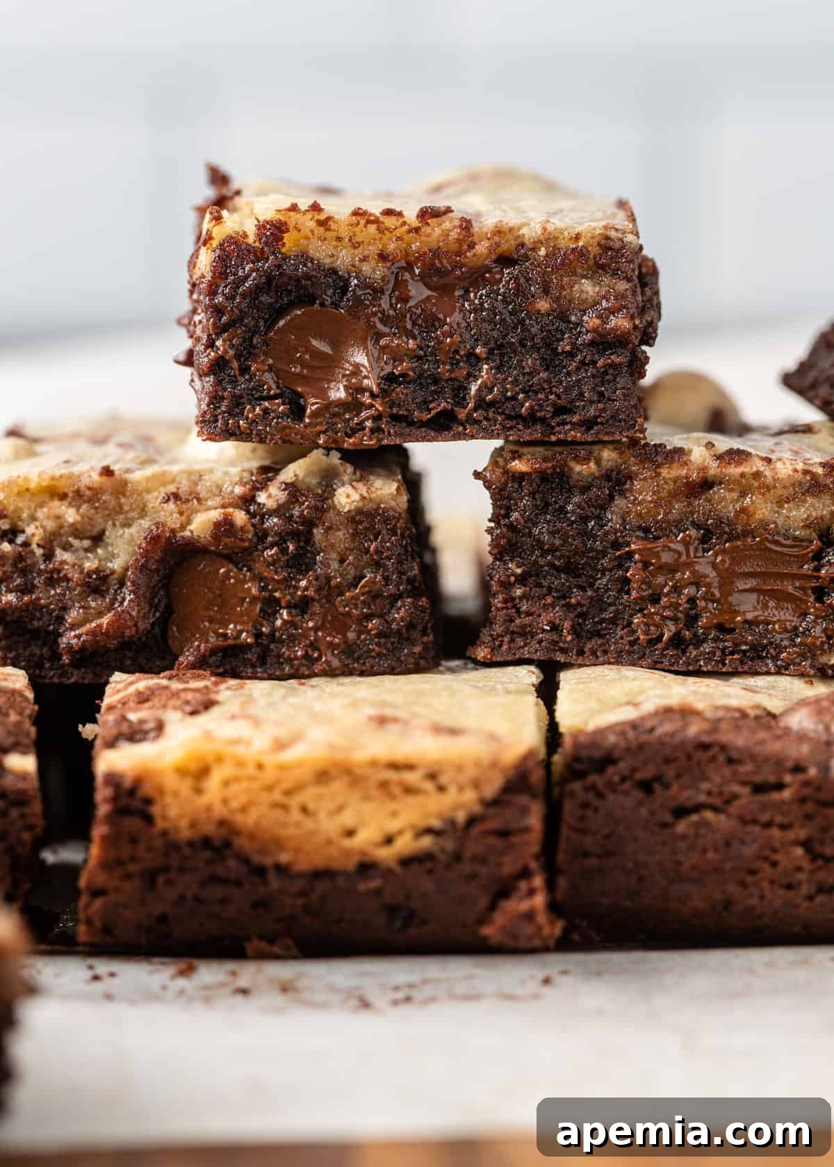 A beautiful stack of homemade, fudgy, and chewy tahini brownies, showcasing their rich texture.