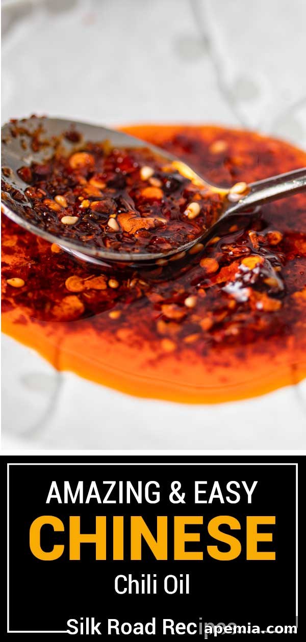 chili oil with spoon on white dish