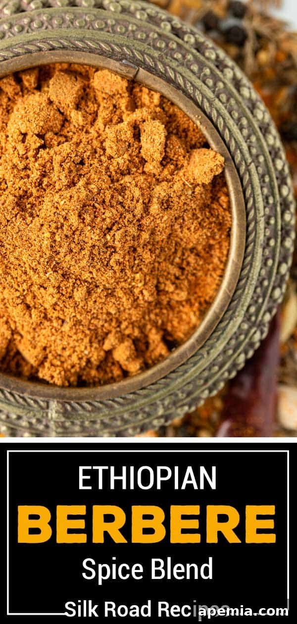 titled image (and shown): Ethiopian Berbere spice blend in a bowl, with whole spices around it