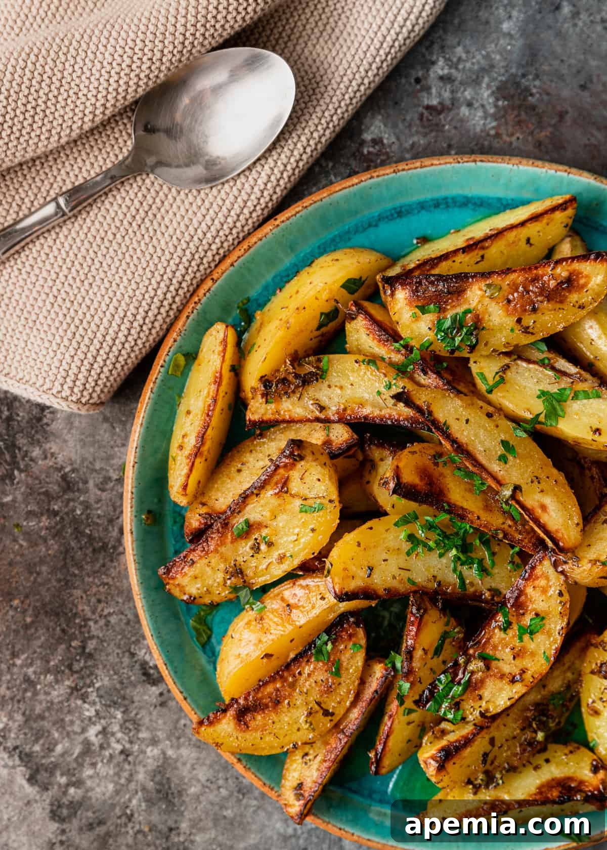 overhead: vibrant lemon garlic potatoes side dish, ready to serve