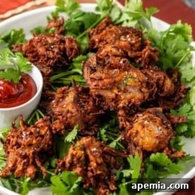 A dish of Onion Pakora (Indian Onion Fritters)