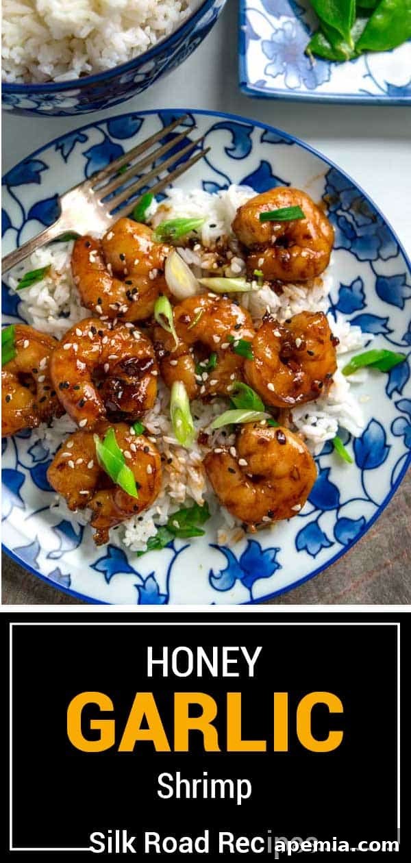 An overhead shot of honey garlic shrimp served with sides, perfectly plated and ready to be enjoyed.