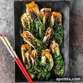 chinese cabbage in brown sauce sprinkled with sesame seeds