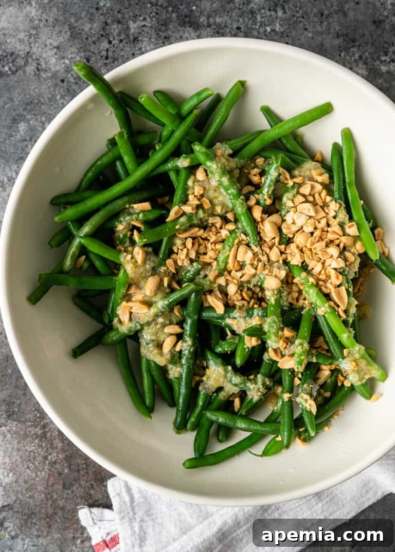 Sesame Garlic Green Beans 6 overhead: adding aromatic seasoning to the Asian green beans vinaigrette