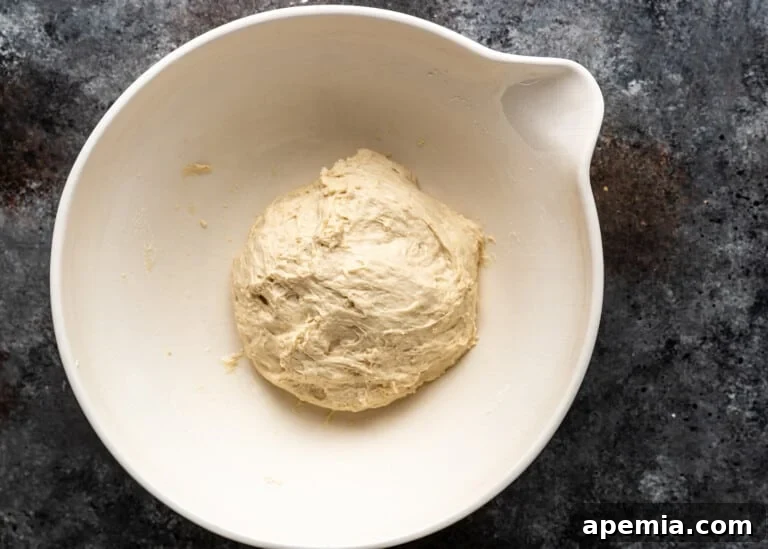 Beloved Turkish Ramadan Pide 15 Ramazan Pidesi dough formed into a ball and covered, allowing it to rest and rise further.