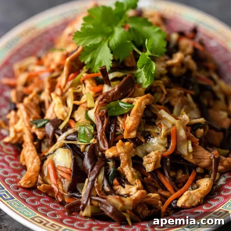 overhead view of Moo Shu Pork, showing tender pork and crisp vegetables