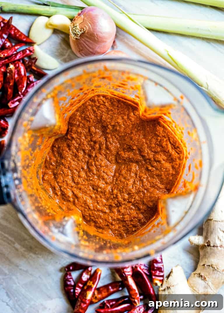 overhead: freshly blended red curry paste recipe in a bowl, ready to be stored