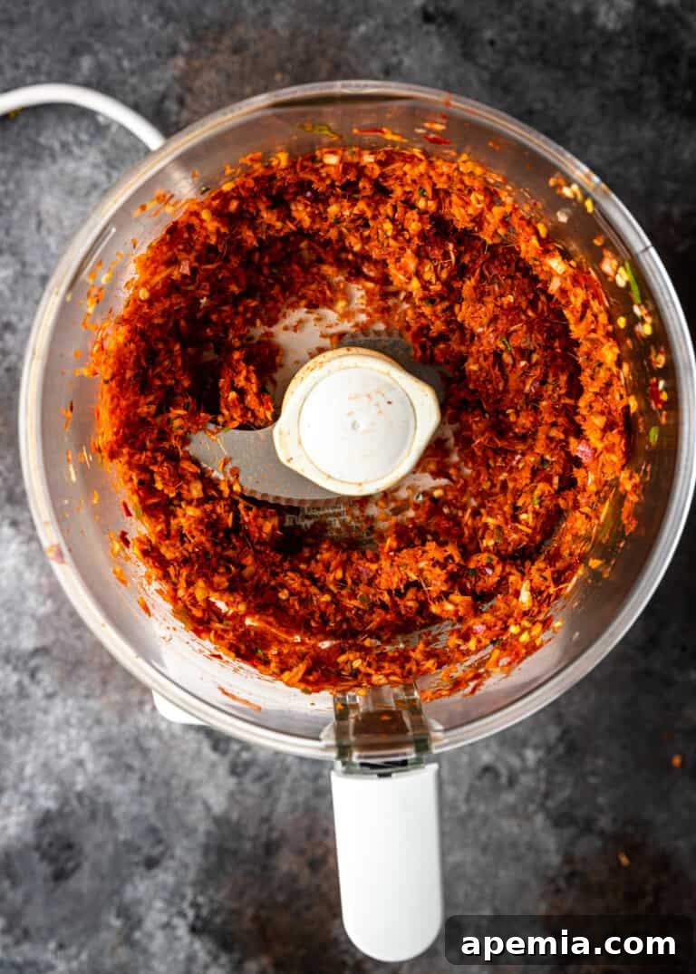 overhead process shot: initial blending of fresh ingredients for panang curry paste