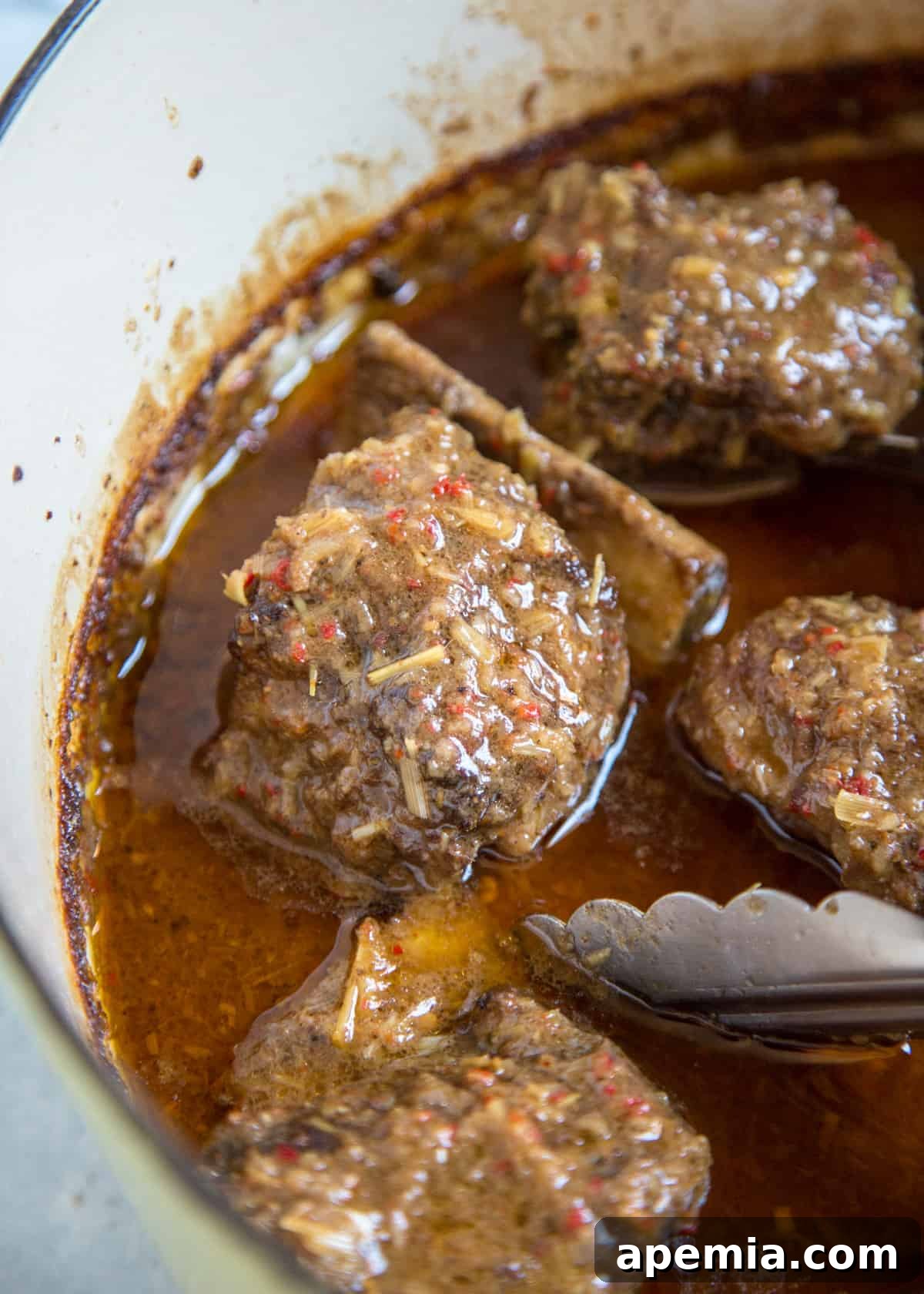 Slow-Cooked Malaysian Beef Short Ribs 6 short ribs searing in a pan