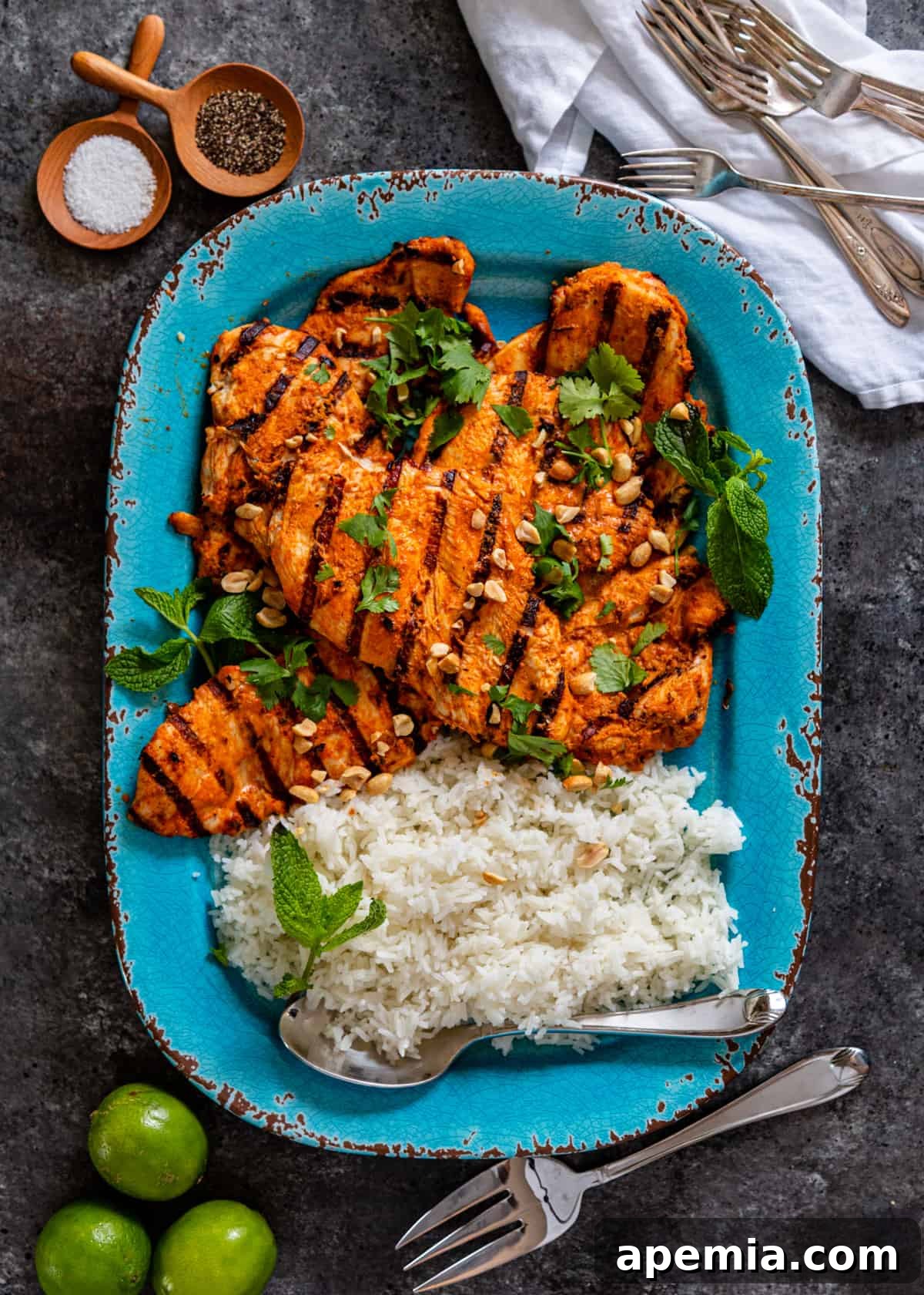 Fragrant Thai Curry Grilled Chicken 5 overhead view of thai curry chicken with rice and limes
