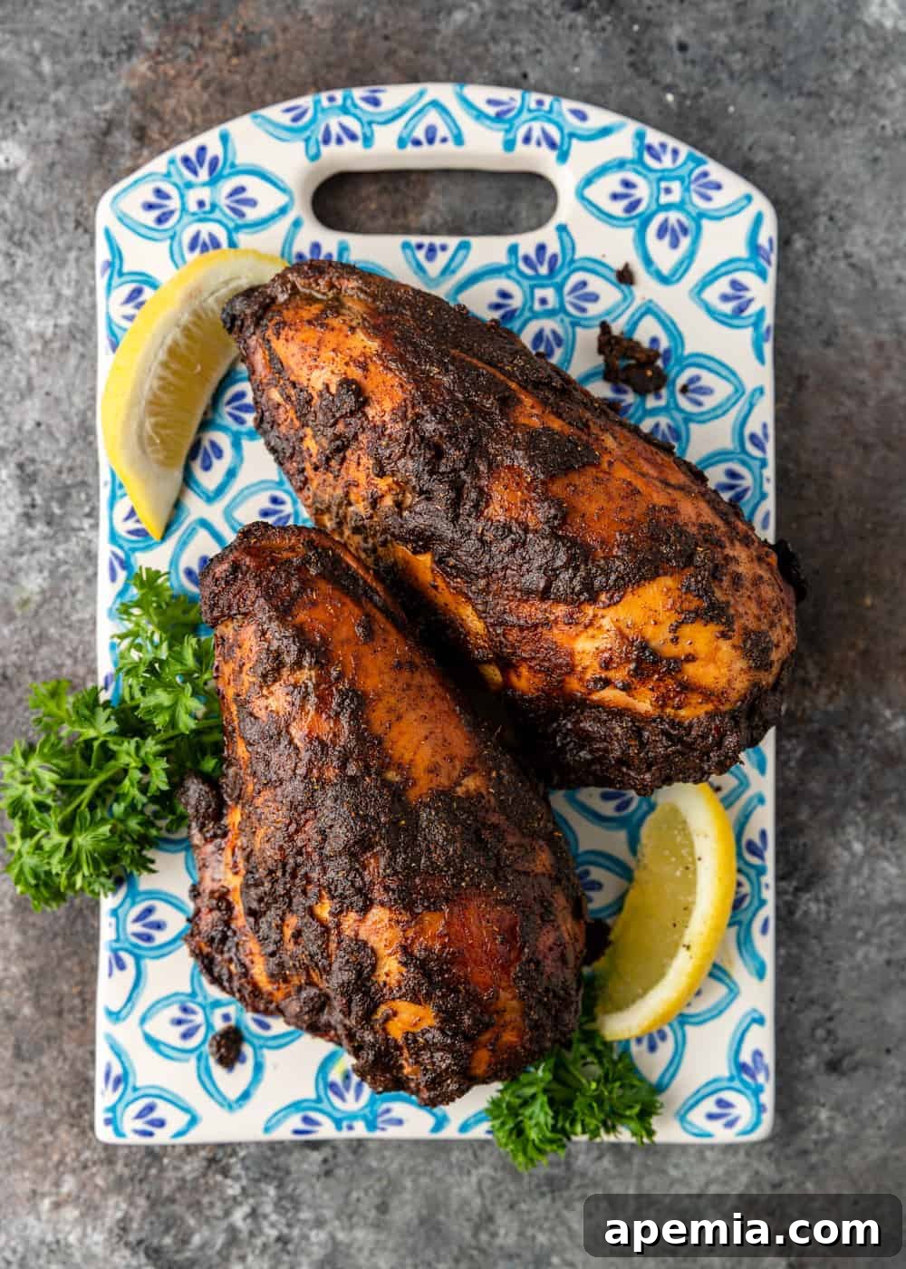 Grilled Middle Eastern spiced chicken breasts, showcasing a beautiful char and golden-brown color.