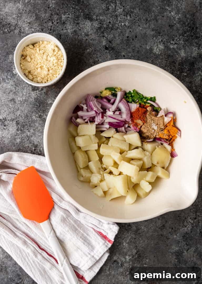 bowl with chopped potatoes and other ingredients