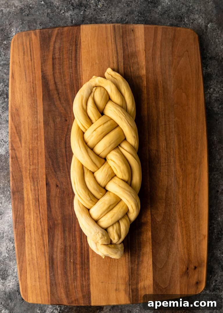 Process shot: The finished Challah braid, ready for its final proof.