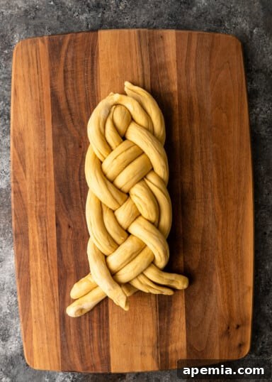 Completed 6-braid Challah loaf, ready for the next step.