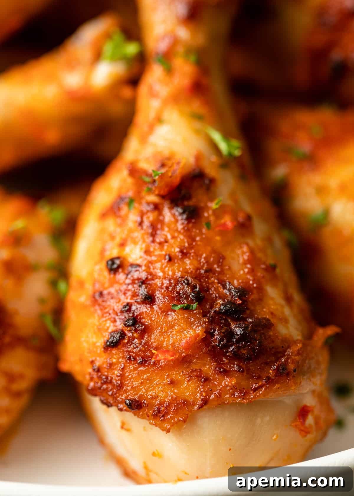 Fiery Peri Peri Chicken 6 Closeup of a single perfectly cooked and juicy chicken drumstick