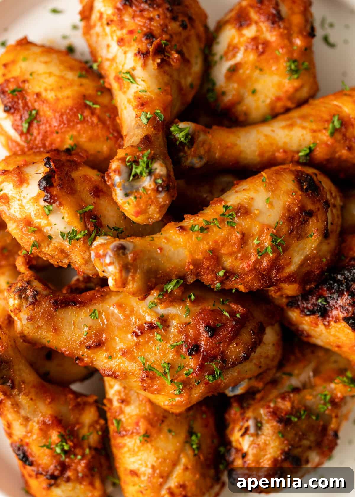 Fiery Peri Peri Chicken 10 Overhead closeup: Platter with delectable Peri Peri Chicken and fresh garnish