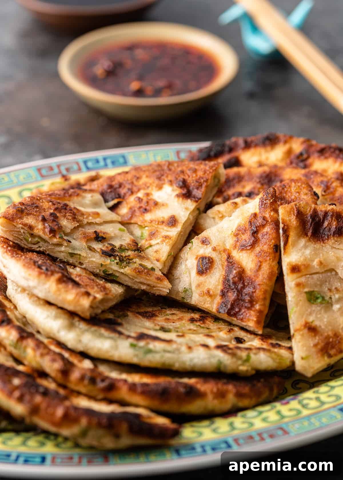 side view: stacked spring onion pancakes, showcasing their thickness and layers