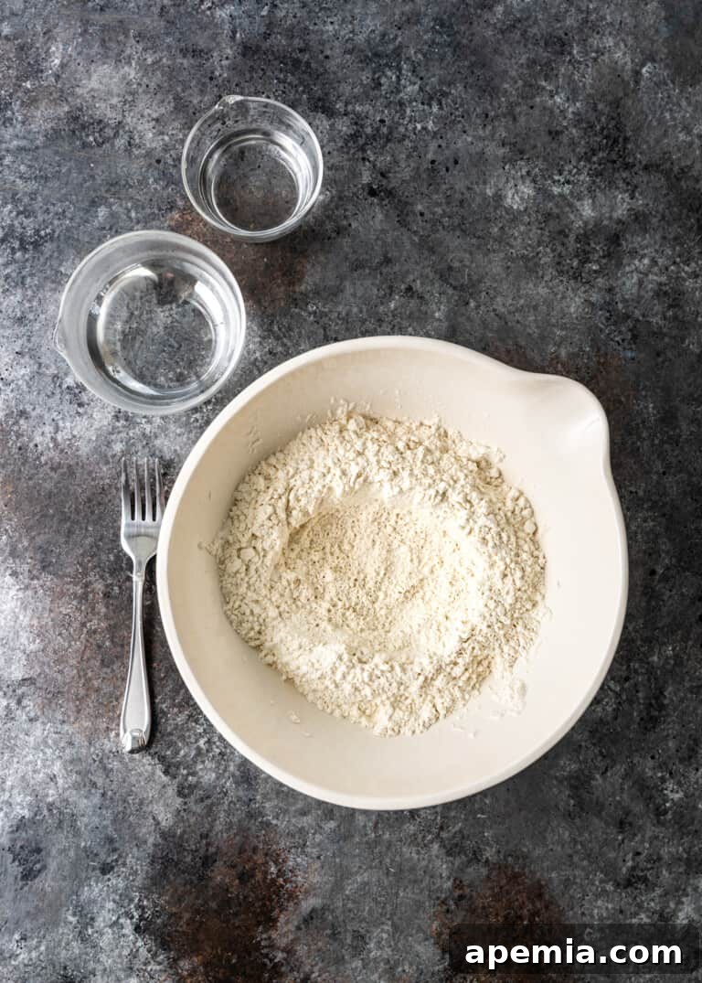 overhead: bowl with dry ingredients for scallion pancake dough