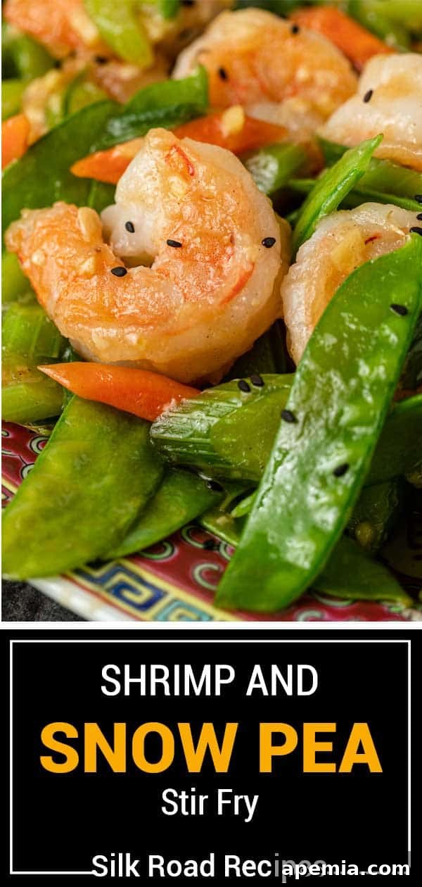 A stunning vertical shot of Shrimp and Snow Peas Stir Fry, showcasing its fresh ingredients and vibrant colors.