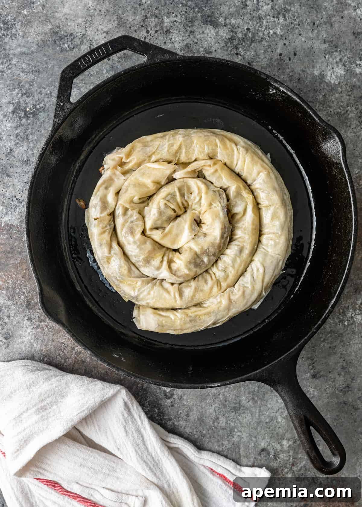 overhead process shot: my borek recipe cooking in a skillet