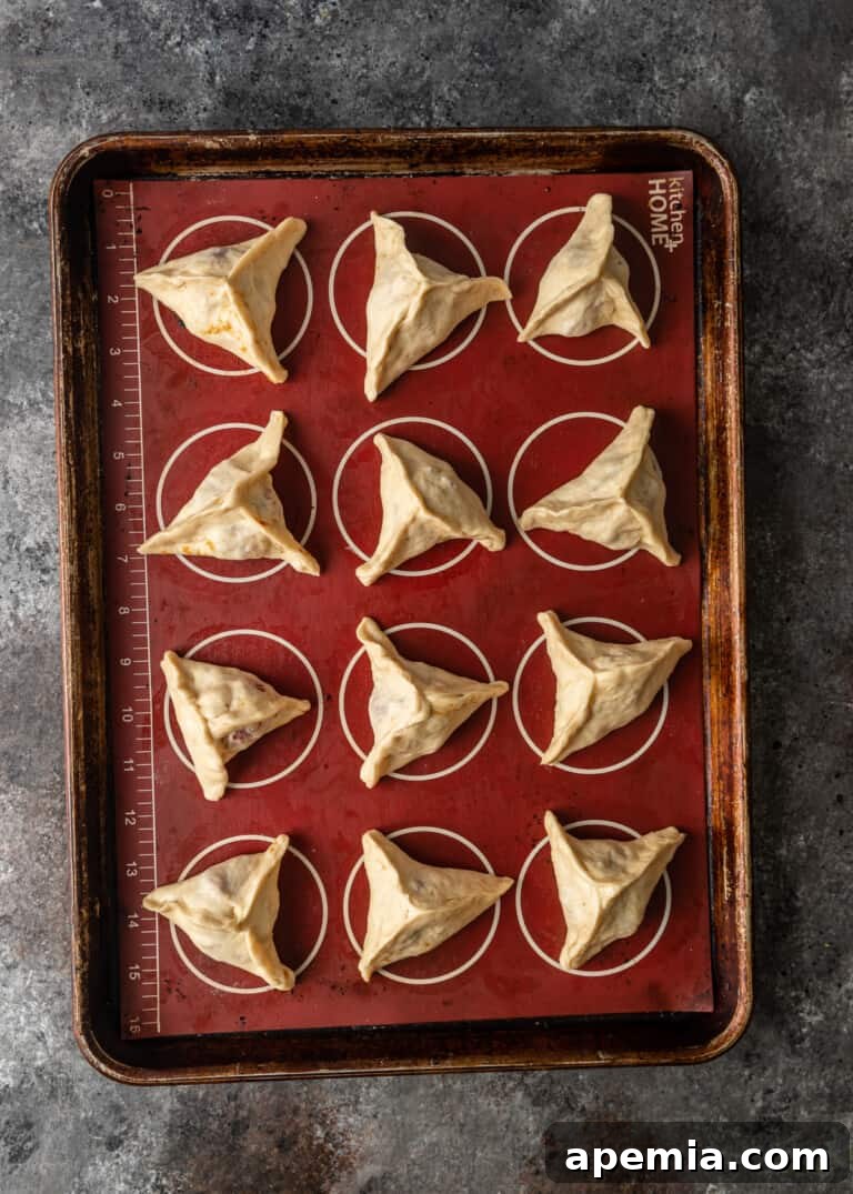 overhead process shot: pinching closed dough 