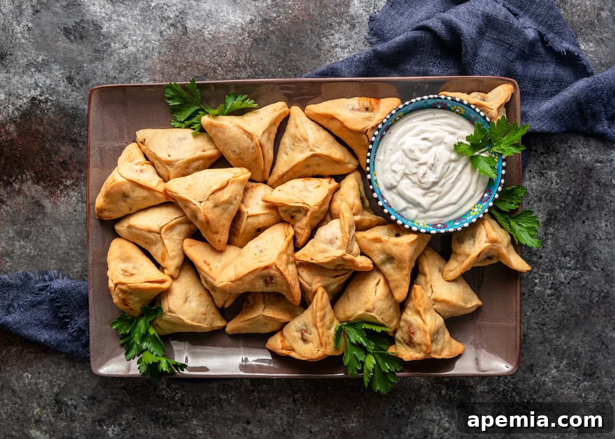 overhead: a platter of fatayer with dipping sauce