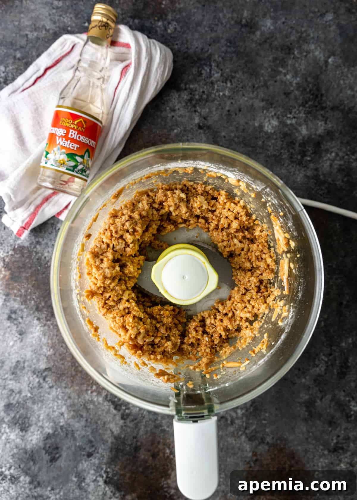 Process shot: Pulsing all almond filling ingredients in a food processor to achieve a loose, wet crumb.
