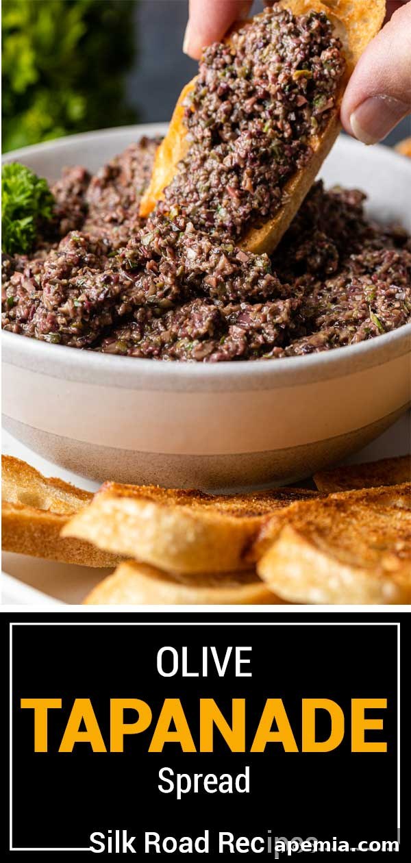 Savory Mediterranean Tapenade 12 A beautifully presented bowl of homemade olive tapenade spread, ready to be enjoyed as a gourmet Mediterranean appetizer.