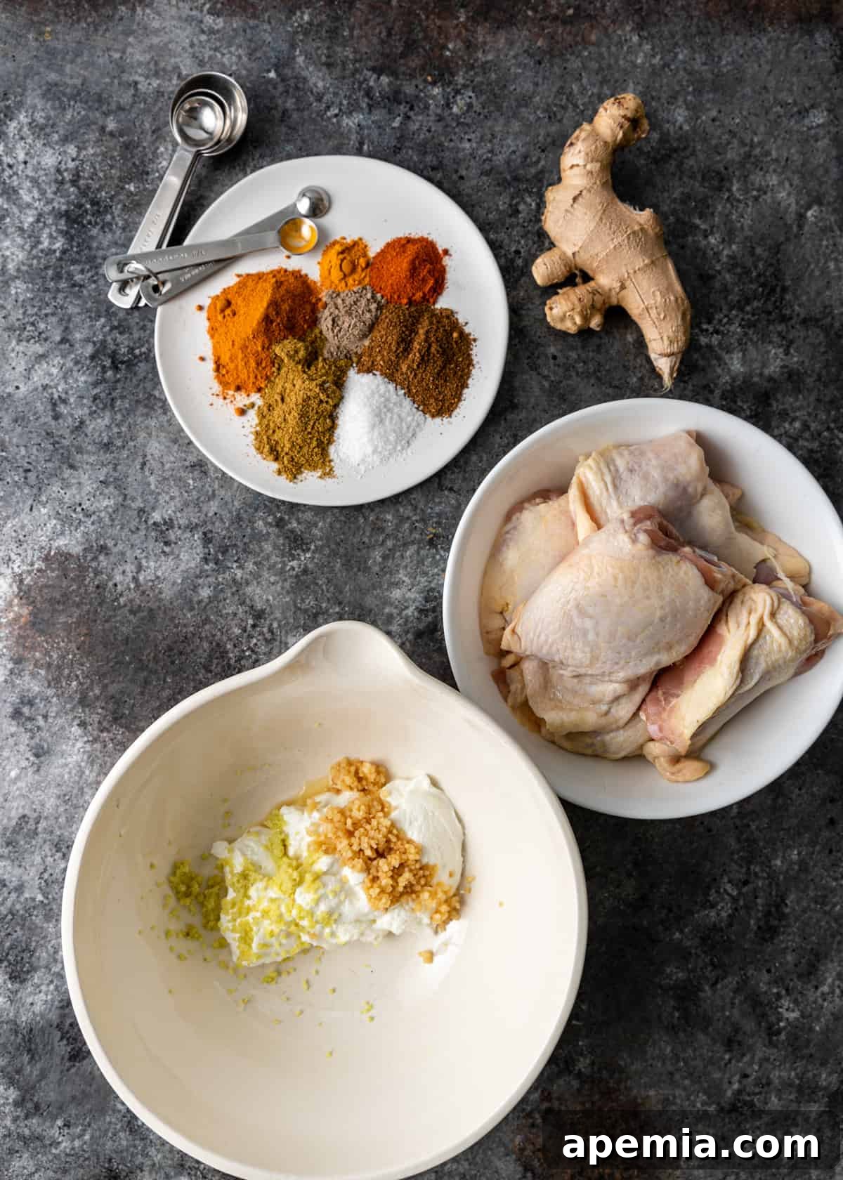 overhead: raw chicken and spices to make biryani