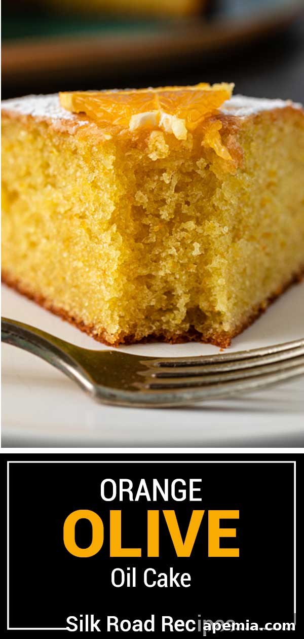 A vibrant and appetizing full image of the orange olive oil cake, beautifully baked and presented.
