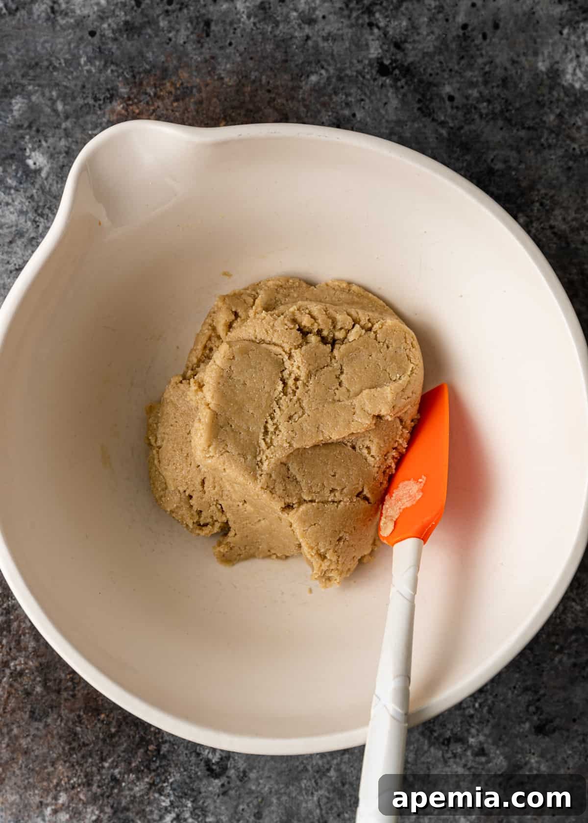 overhead process shot: ball of dough in a bowl