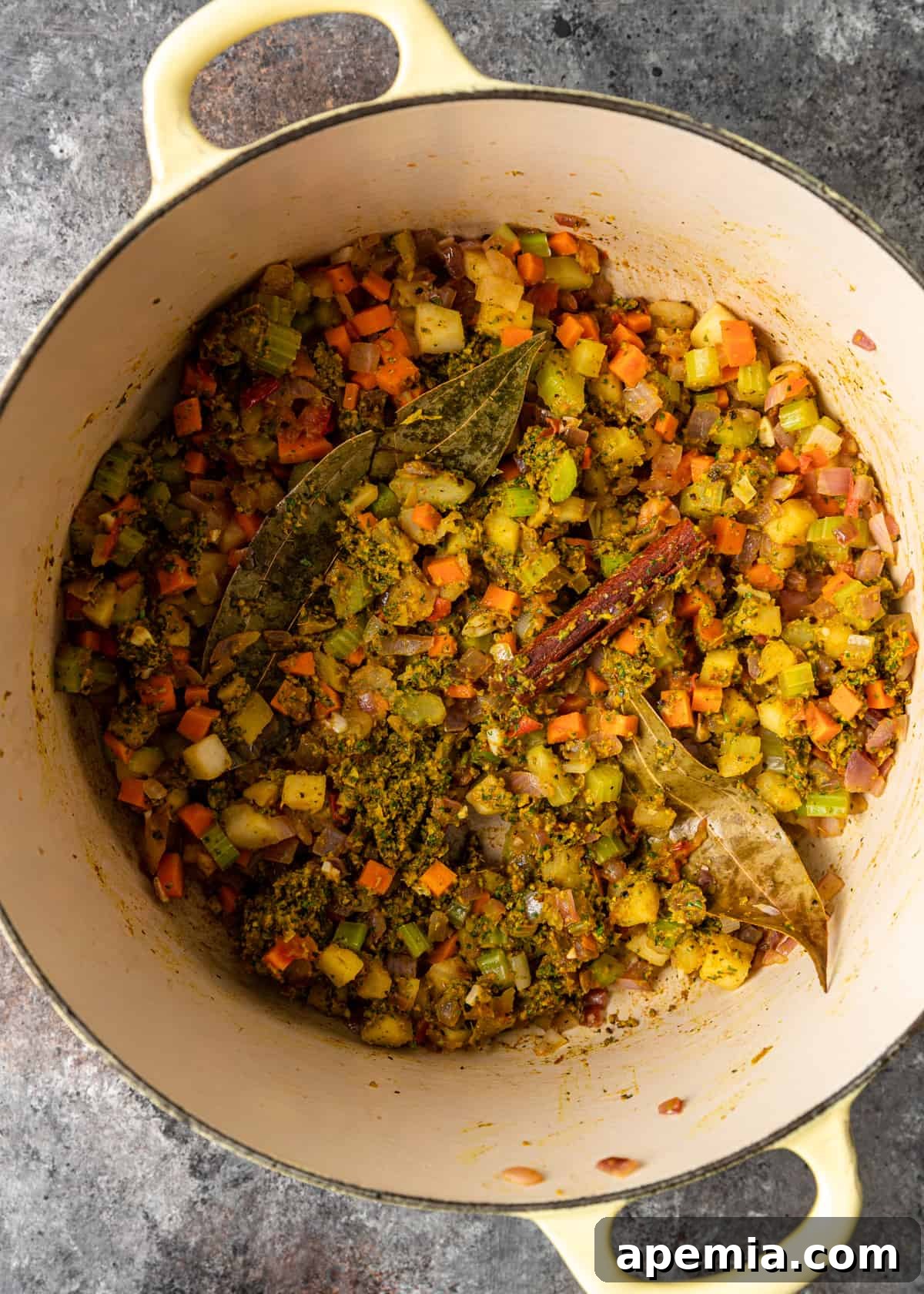 overhead process shot: titled image (and shown) add the spice paste