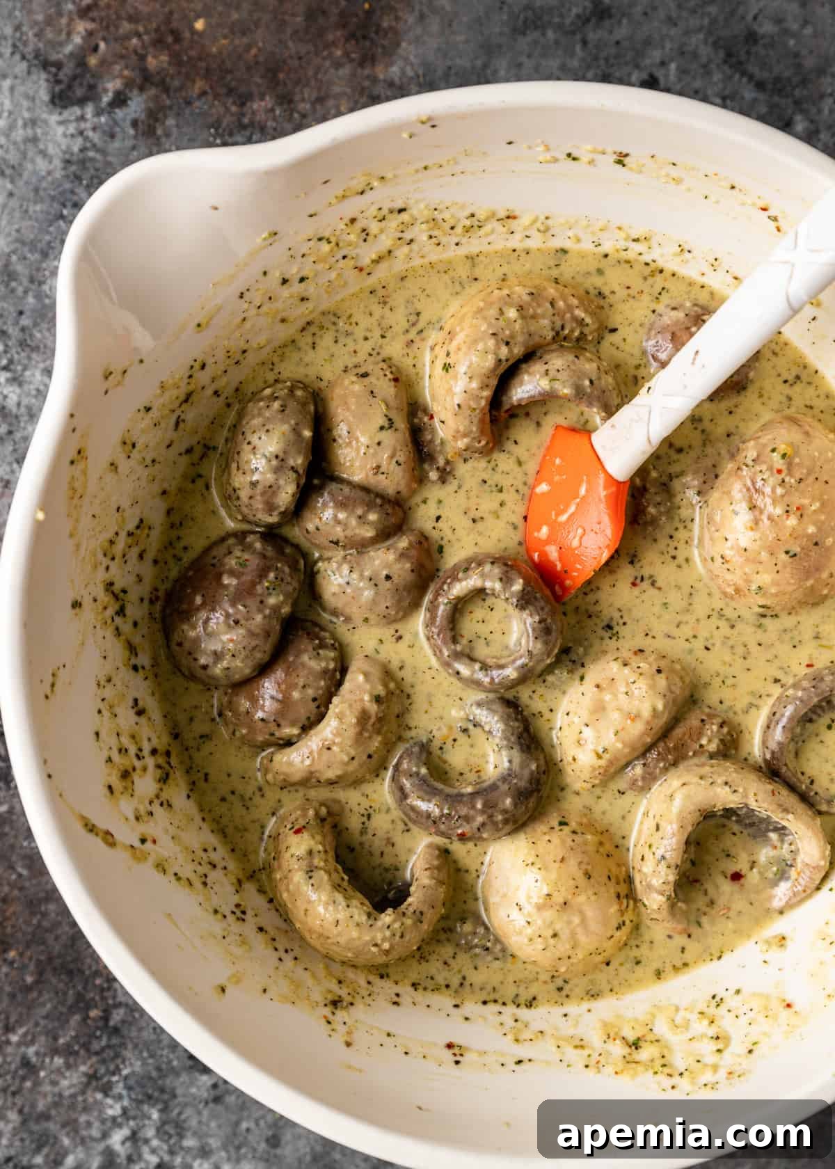 mushrooms in a bowl with marinade