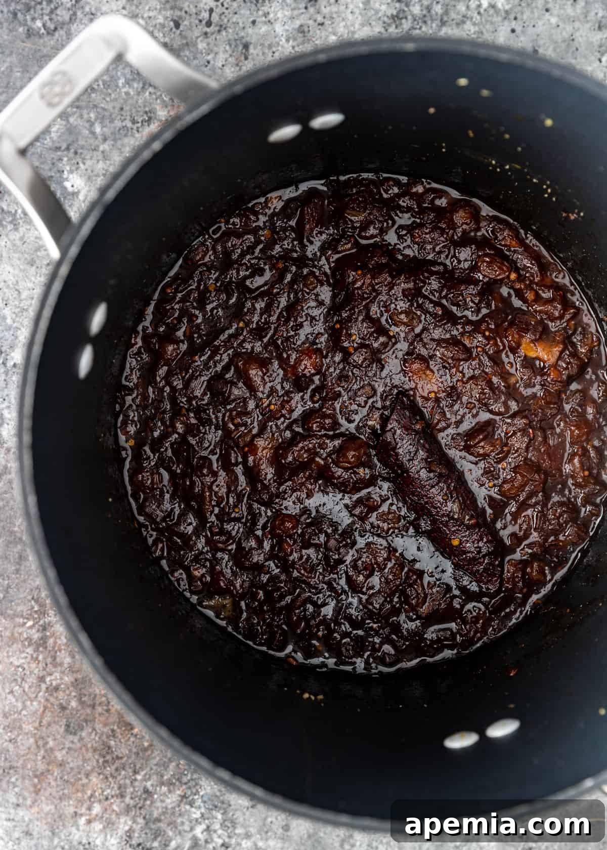 Mastering Major Grey Chutney 6 Close-up of Major Grey Chutney simmering to perfection, becoming thick and syrupy