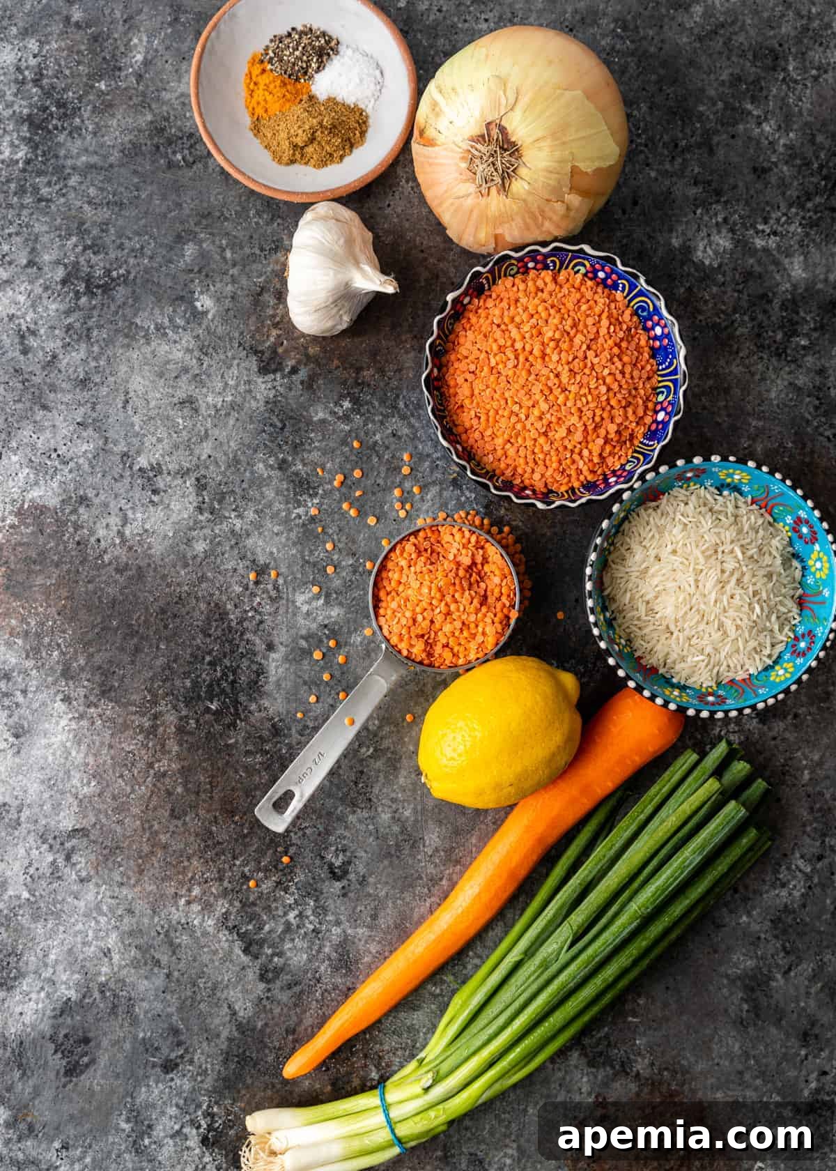 ingredients in small bowls for red lentil soup recipe