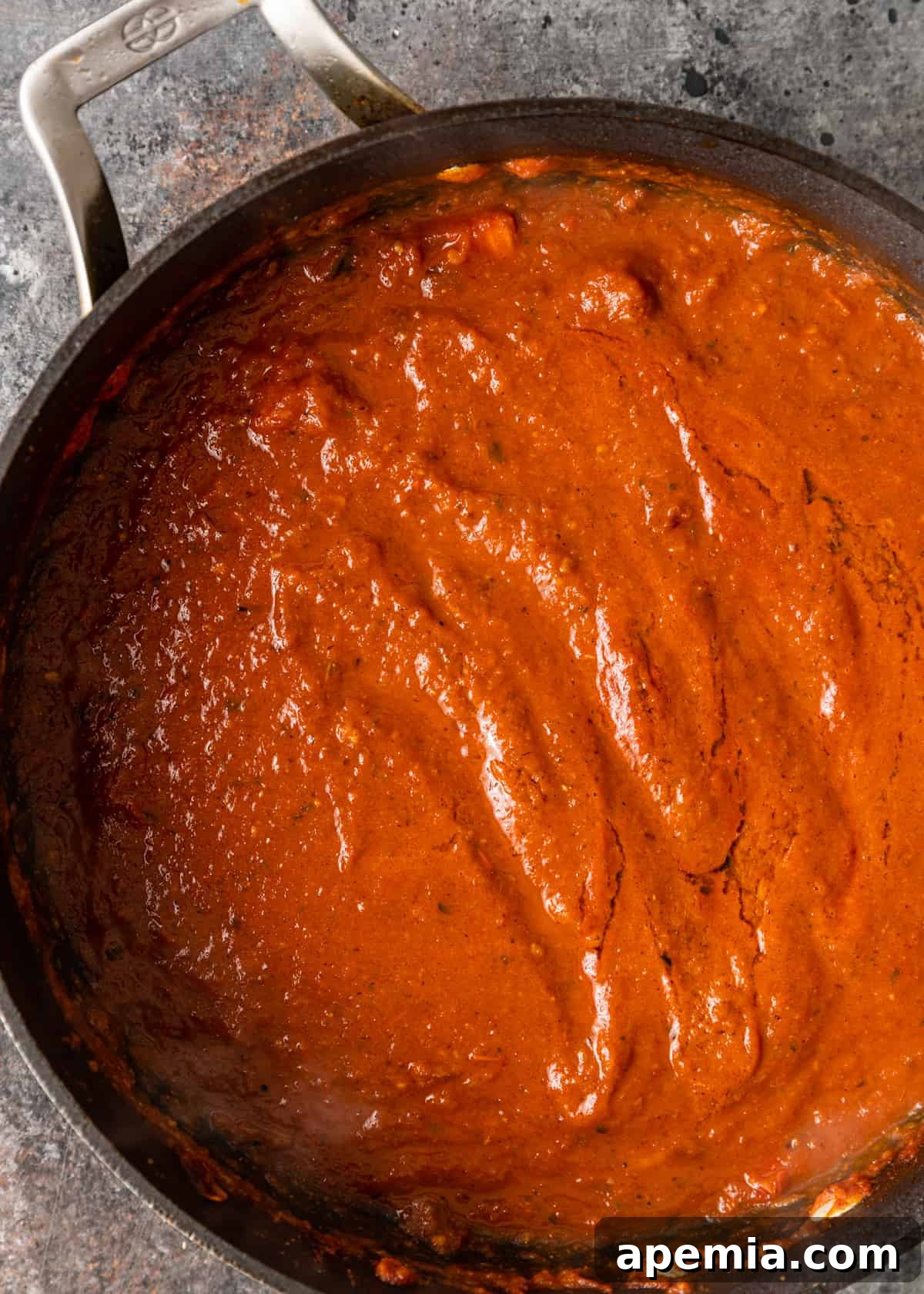 overhead process shot: titled image (and shown) puree to smooth curry