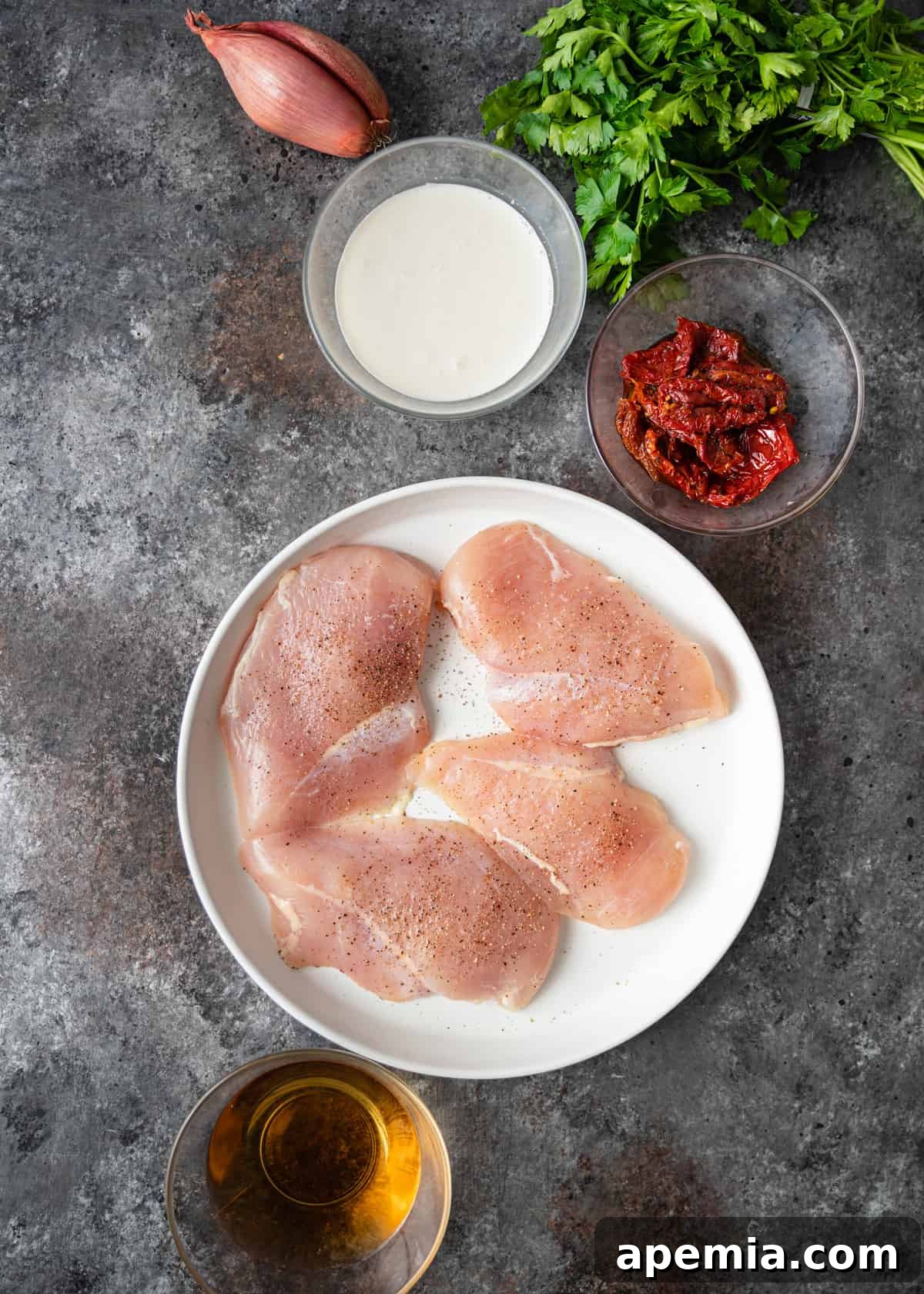 Seasoned raw chicken breasts