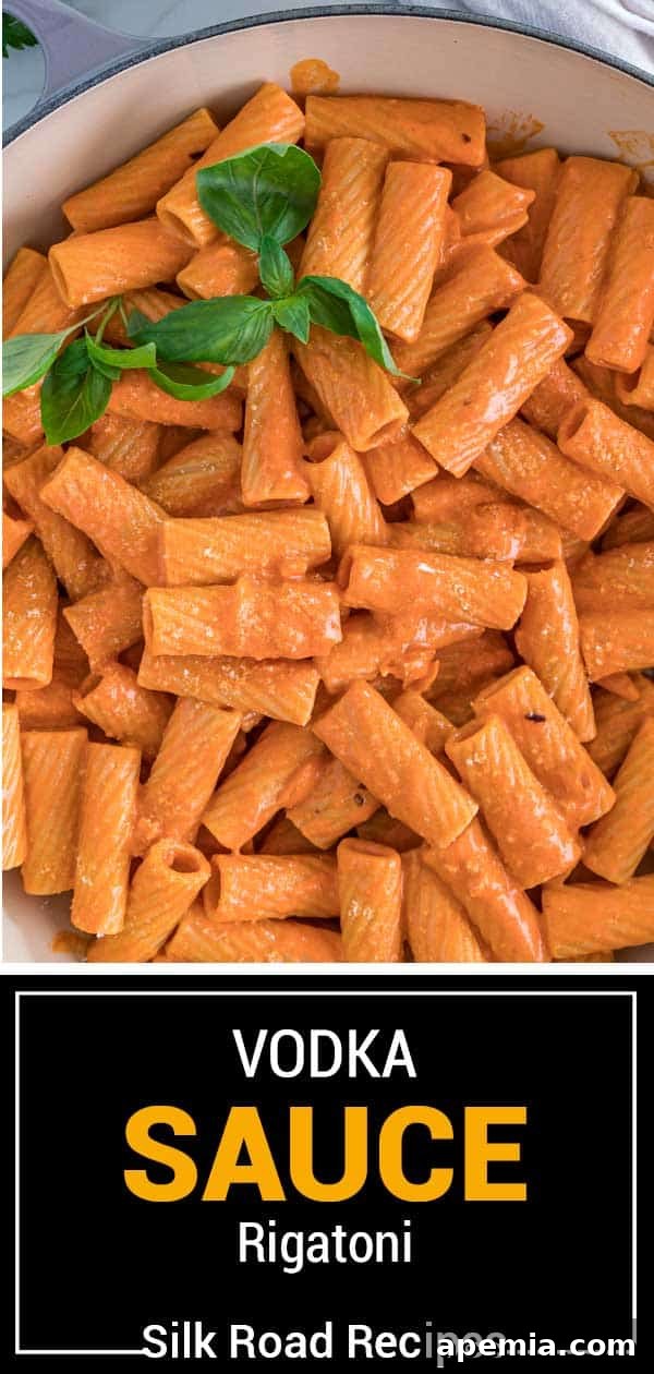 Titled image (and shown): a beautifully plated dish of rigatoni with rich vodka sauce, garnished with fresh basil leaves.