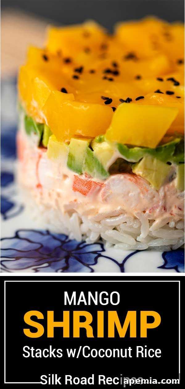 Final titled image of multiple mango shrimp sushi stacks with coconut rice, ready to serve