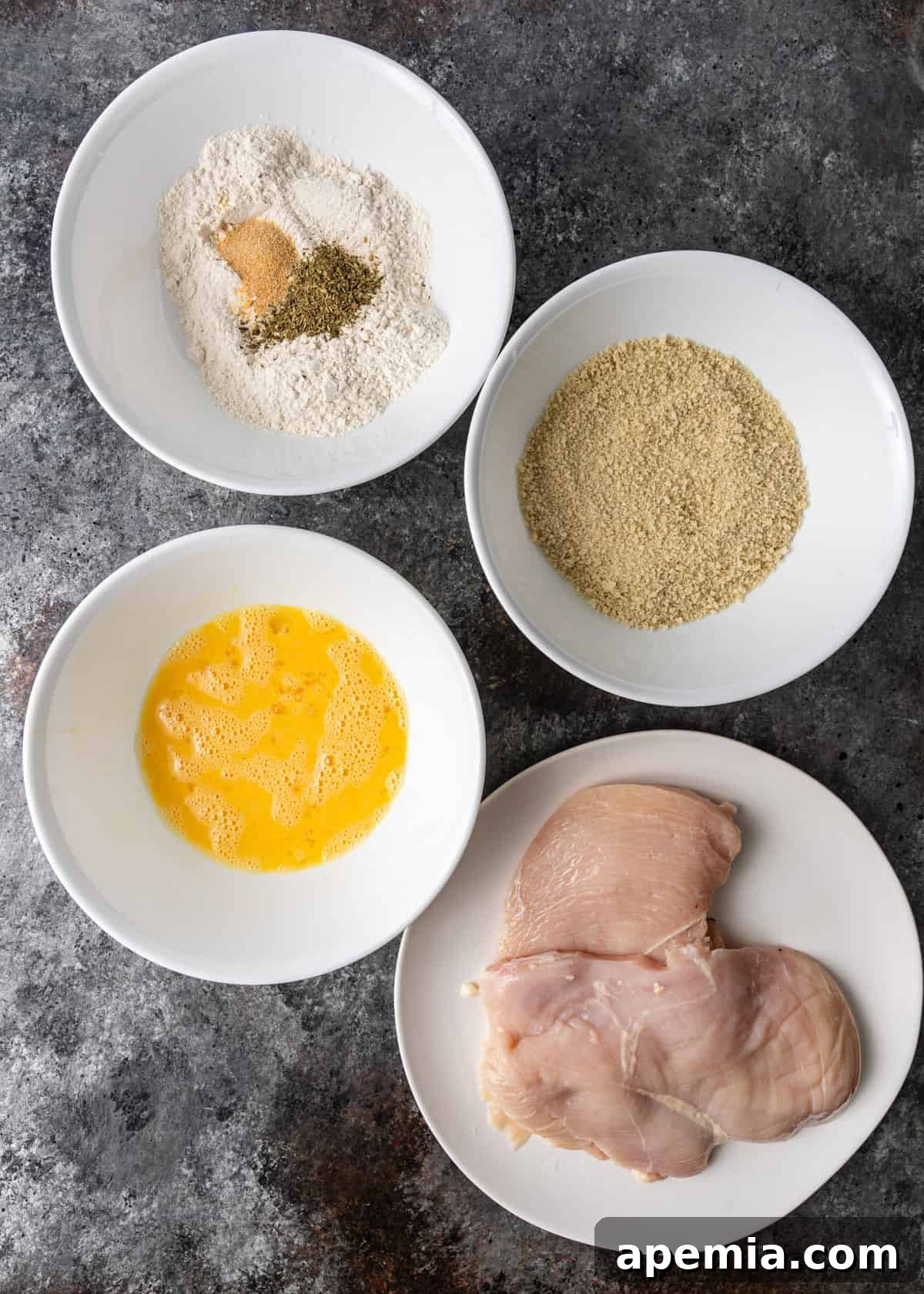 overhead: ingredients needed for chicken parmigiana recipe