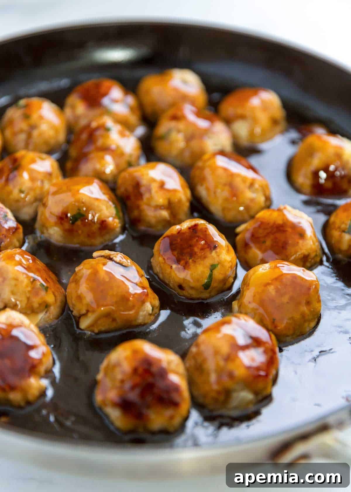 closeup: cooking my teriyaki meatball recipe in a skillet