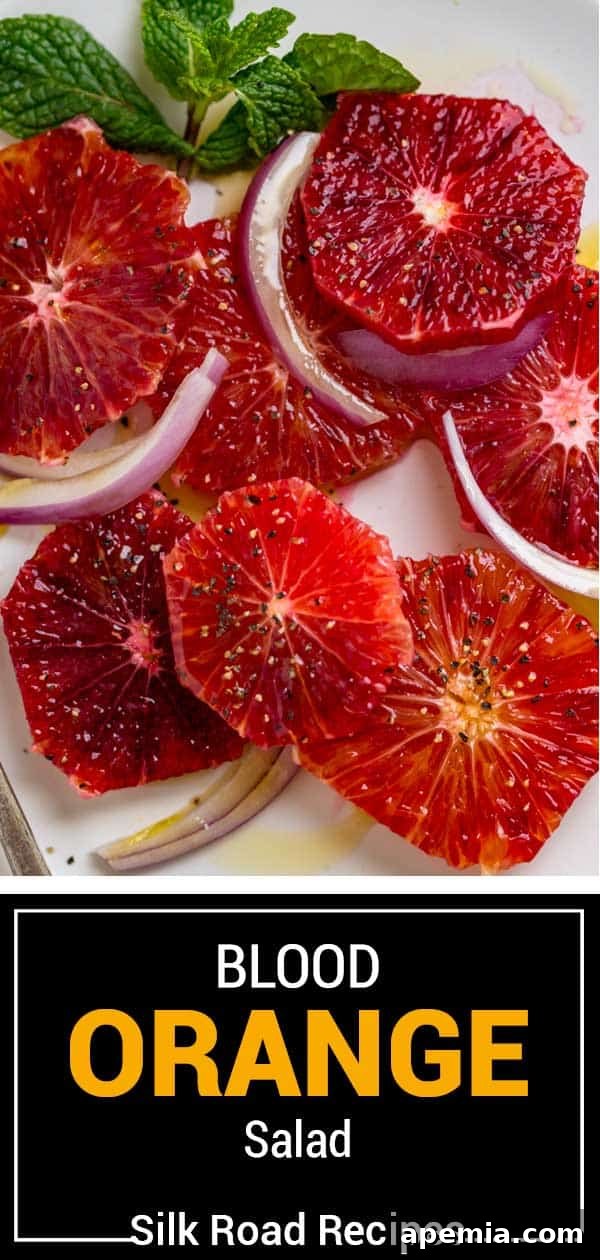 Titled image (and shown): a vibrant blood orange salad presented beautifully, ready for serving.
