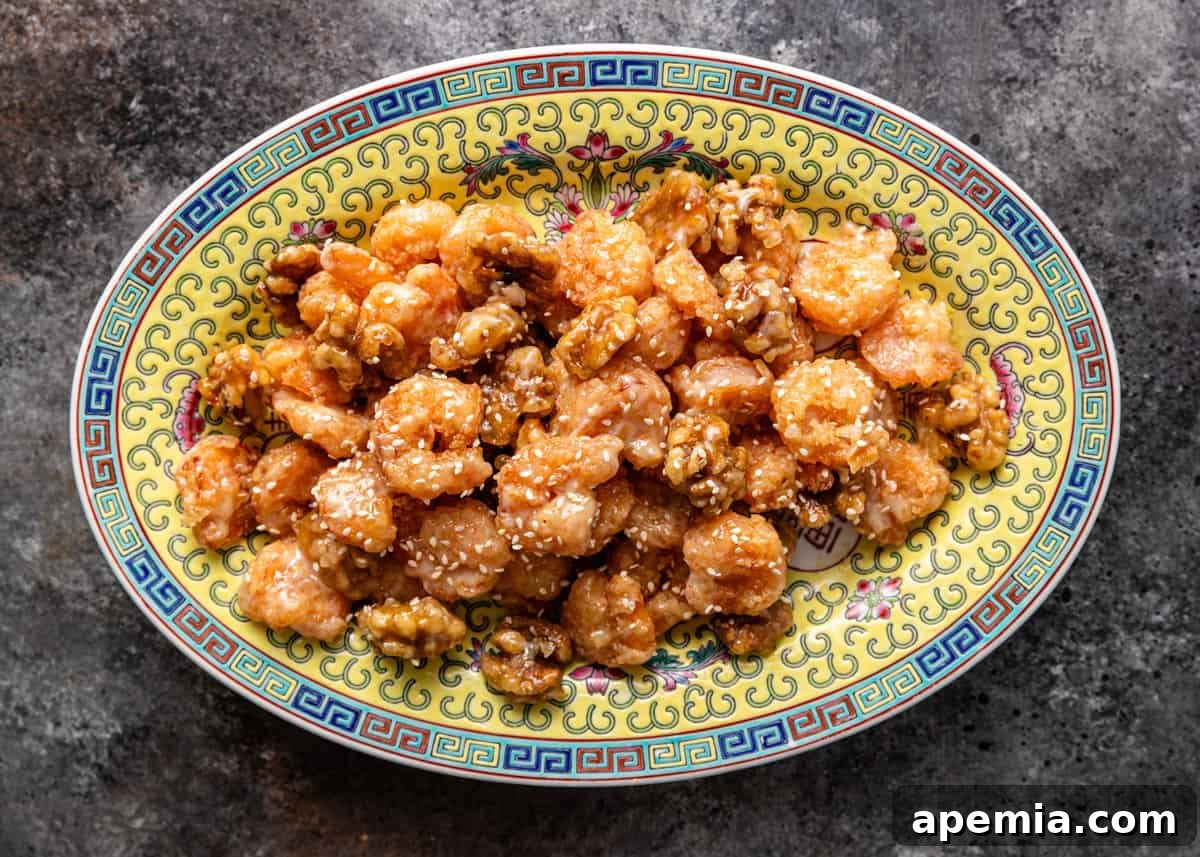 Golden Honey Walnut Shrimp 9 A grand platter of honey walnut shrimp, arranged beautifully for serving, highlighting the golden fried shrimp and candied nuts.