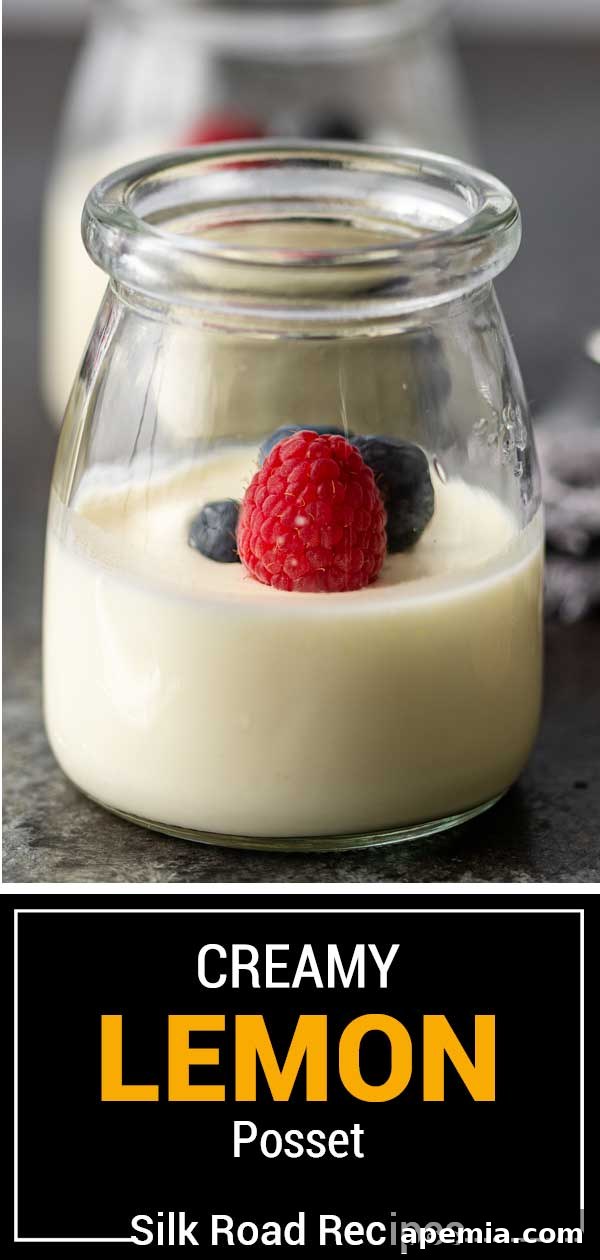 Zesty Creamy Lemon Posset 11 Titled image showing creamy lemon posset in a glass jar, garnished with a sprig of mint.