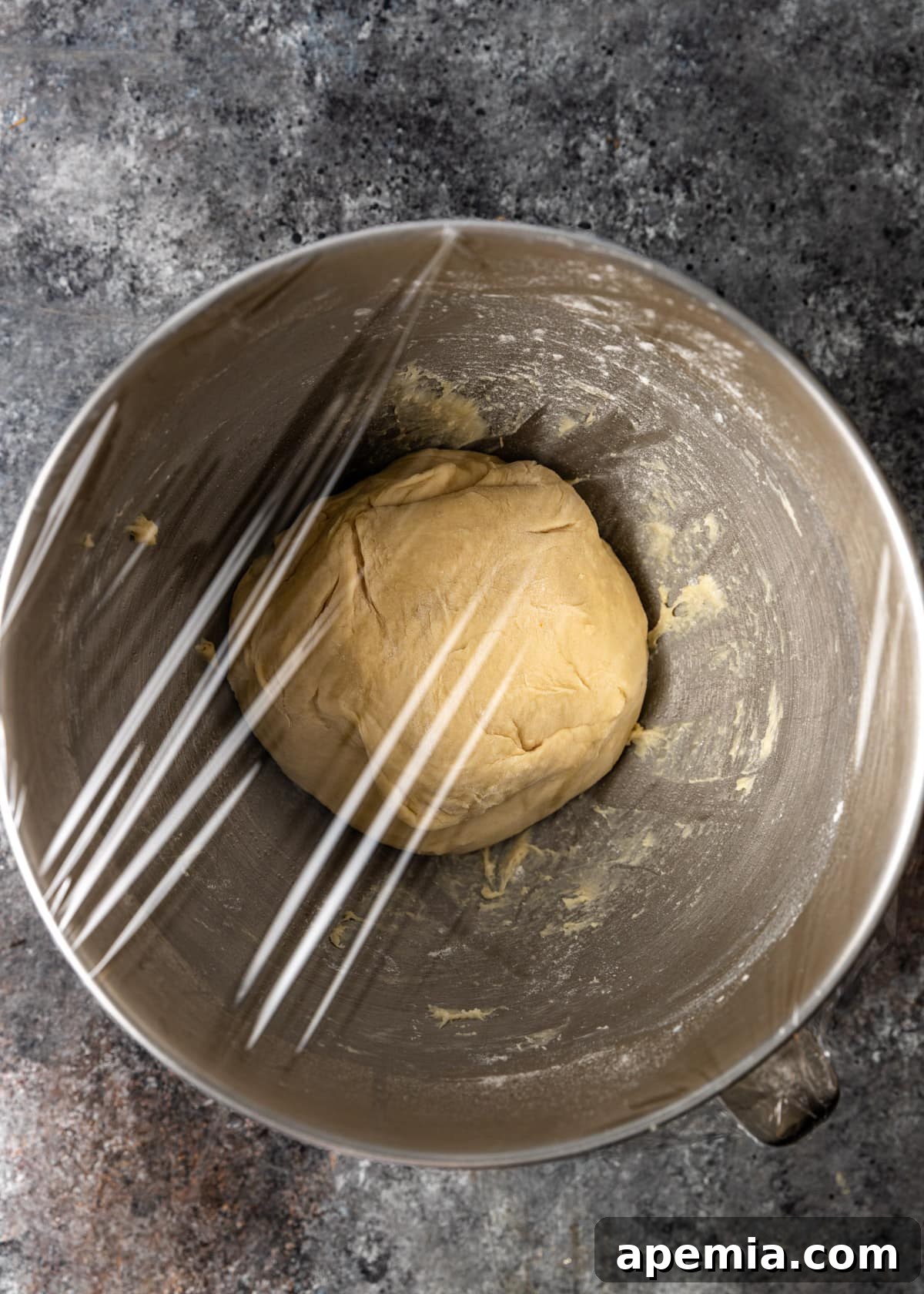 Overhead process shot: Japanese milk bread dough covered and left to rise.