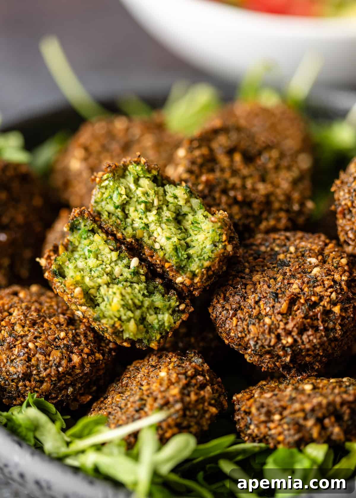 closeup: venter of my Egyptian falafel recipe with processed herbs and beans showing